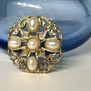 1928 Faux White Pearl Gold Tone Round Brooch 1-1/2" Cutout Scroll Swirled Back